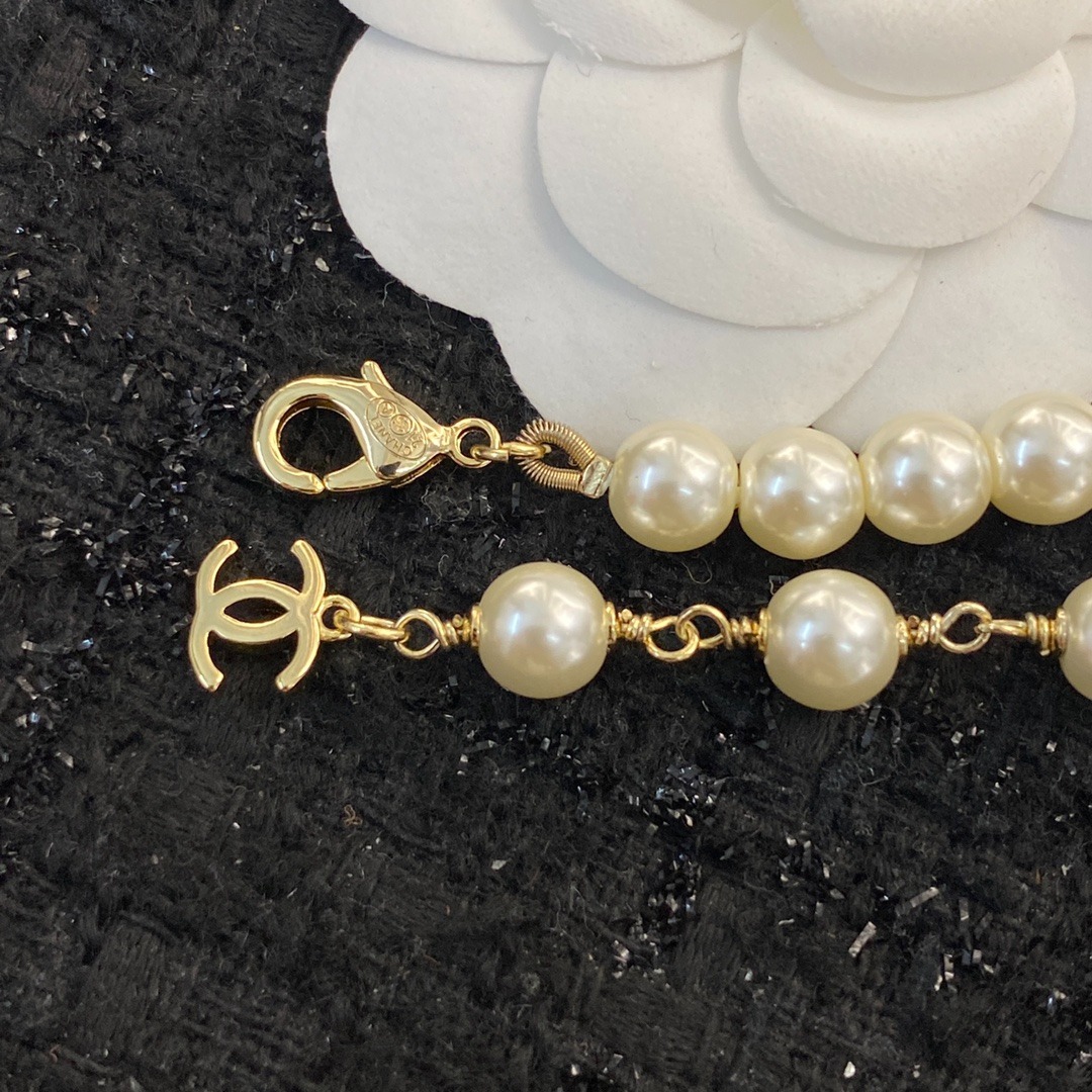 Ch**el Pearl And Crystal Logo Gold Tone For Women